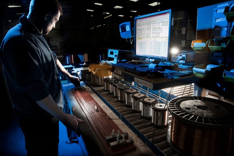 Engineer testing resistance wires.