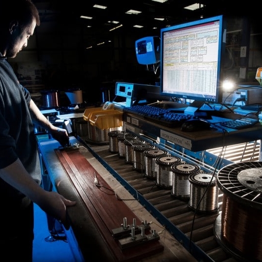 Engineer testing resistance wires.